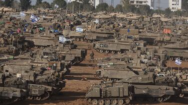 Israeli military vehicles gathered near the border with Gaza. EPA
