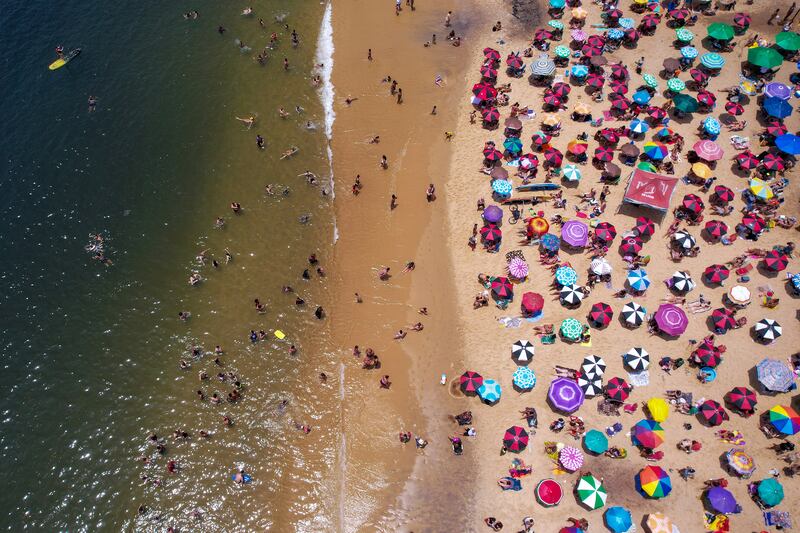 A crowded beach in Rio de Janeiro during a record heatwave in Brazil