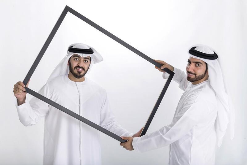 Hamad Al Shirawi, left, and his brother Abdulla have <a href="http://www.thenational.ae/business/retail/20160613/emirati-brothers-find-the-picture-perfect-first-business">set up a Dubai branch of a US-based business </a>that creates custom-framed portraits within 90 minutes. Reem Mohammed / The National