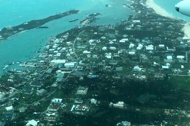 This aerial photo provided by Medic Corps, shows the destruction brought by Hurricane Dorian on Man-o-War Cay, Bahamas, Tuesday, Sept.3, 2019. Relief officials reported scenes of utter ruin in parts of the Bahamas and rushed to deal with an unfolding humanitarian crisis in the wake of Hurricane Dorian, the most powerful storm on record ever to hit the islands. (Medic Corps via AP)