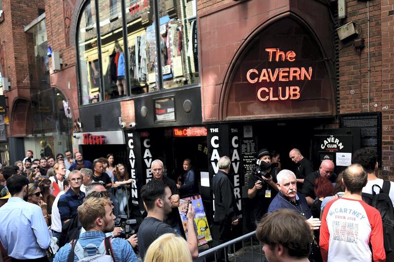 LIVERPOOL, ENGLAND - JULY 26:  Fans of Paul McCartney make their way inside The Cavern Club, as the singer plays a one off gig at the legendary venue on July 26, 2018 in Liverpool, England. (Photo by Richard Martin-Roberts/Getty Images)