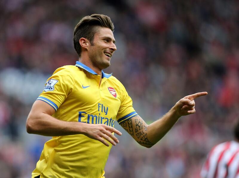 Olivier Giroud has eight goals in 18 Premier League matches for Arsenal this season. Scott Heppell / AP