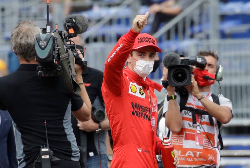 Ferrari driver Charles Leclerc of Monaco, centre, after the qualifying session in Monaco on Saturday. AP