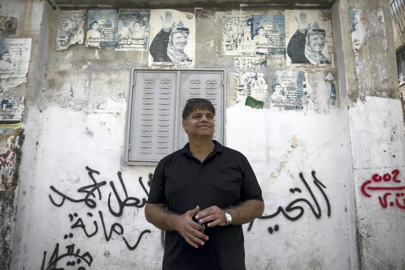 Palestinian Legislative Council Jehad Tomaley in the Al Amari refugee camp near Ramallah on August 20,2017. He was dismissed by Abbas from Fatah last year for calling a meeting of supporters of Dahlan, says the exclusion of the latter and his backers from Fatah is harming the movement. "There's a big negative impact," says Tomaleh, 52, who joined Fatah when he was fifteen and two years later began an eight year prison sentence for "resisting the occupation".Of the younger generation, Tomaleh says "the youth are not in the leading institutions of Fatah. They don't get their role and their rights. They also don't have a presence in the Palestinian Authority. They can't express their opinions. There is a state of frustration and hardship among the youth."(Photo by Heidi Levine for The National).