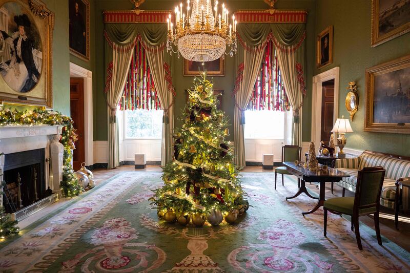 A small Christmas tree stands in the middle of the Green Room. AFP