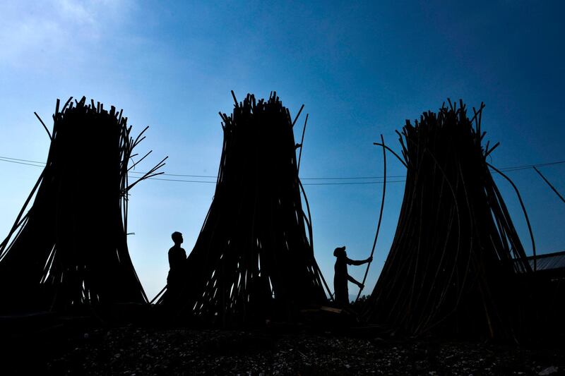 Workers prepare rattan to dry for export at a workshop in Banda Aceh.  AFP