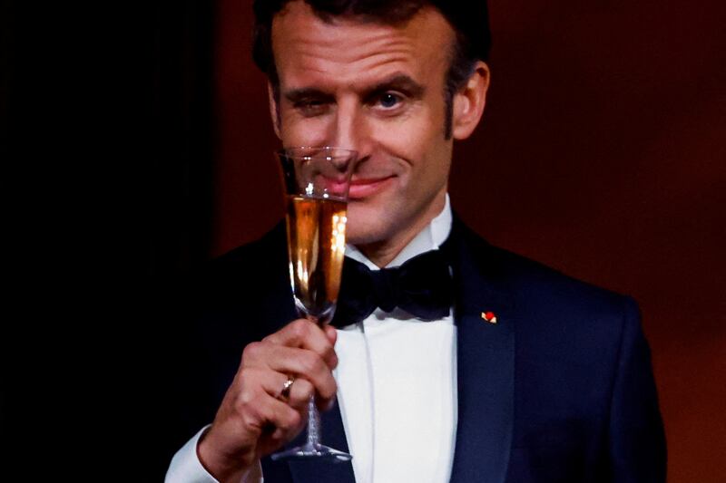 French President Emmanuel Macron makes a toast at the White House in Washington. Reuters