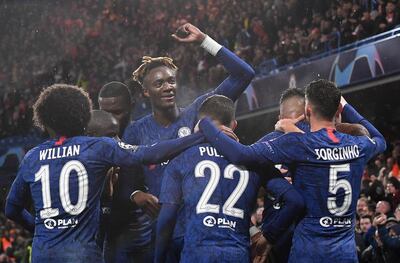 Chelsea striker Tammy Abraham, centre, celebrates scoring against Lille. EPA