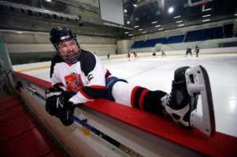 Abu Dhabi, UAE - December 28, 2008 -James Tester stretches before a Scorpians scrimmage at the Abu Dhabi Ice Skating Arena. (Nicole Hill / The National) *** Local Caption ***  NH Scorpian08.jpg