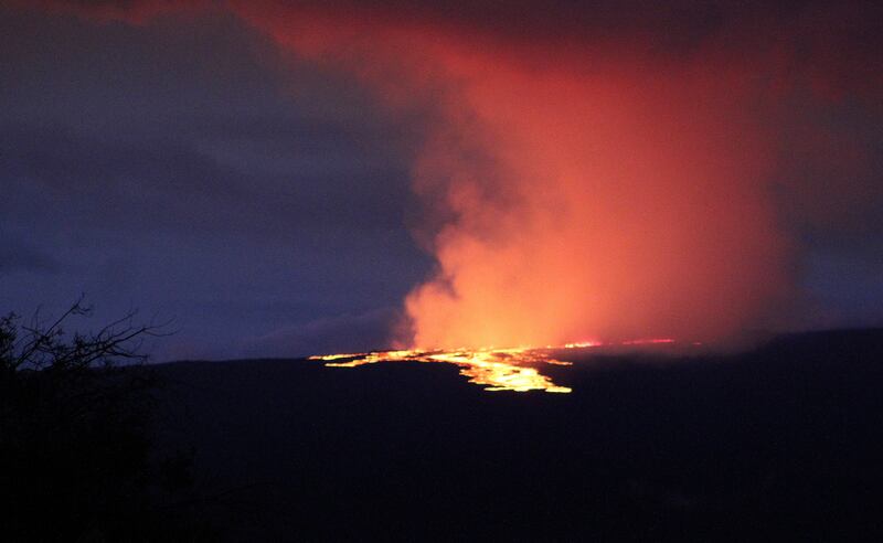 Mauna Loa, the world’s largest active volcano,  began spewing ash and debris from its summit, prompting civil defense officials to warn residents on Monday to prepare in case the eruption causes lava to flow toward communities.  West Hawaii Today / AP