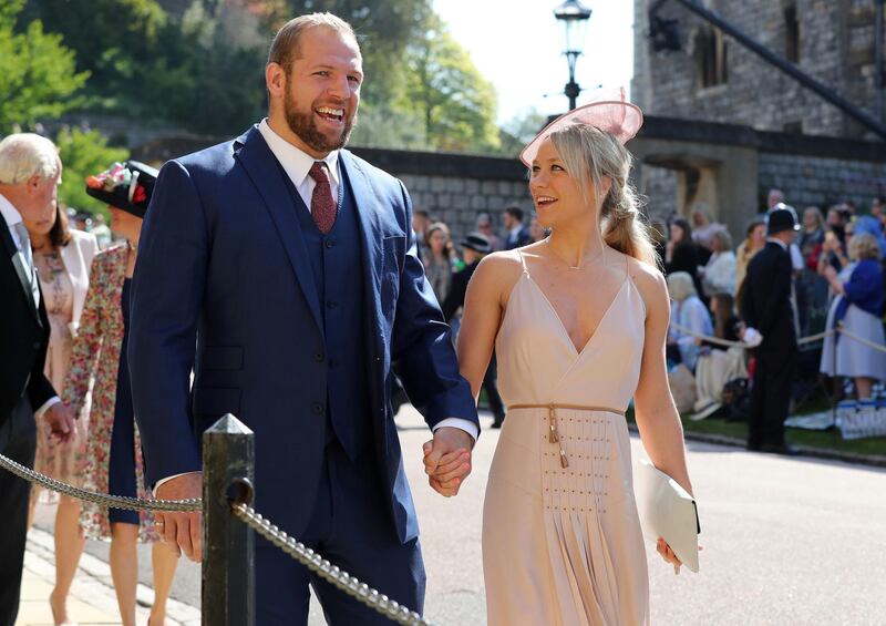 England rugby international James Haskell and Chloe Madeley arrive for the wedding ceremony of Britain's Prince Harry and Meghan Markle at St George's Chapel, Windsor Castle, in Windsor. Gareth Fuller / AFP