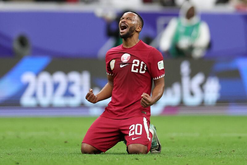 Ahmed Fathy of Qatar celebrates after the team's victory over Palestine. Getty Images