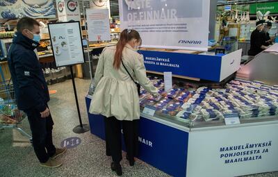 epa08769974 Flight meals of Finnish carrier Finnair are sold in the K-Citymarket Tammisto supermarket in Vantaa, Finland, 24 October 2020. In a time when the travel industry is hit hard by the pandemic coronavirus, Finnair sees selling its onboard inflight meals as a new business opening and an opportunity to keep the chefs employed. Finnair has its own kitchen near K-Citymarket Tammisto.  EPA/MAURI RATILAINEN
