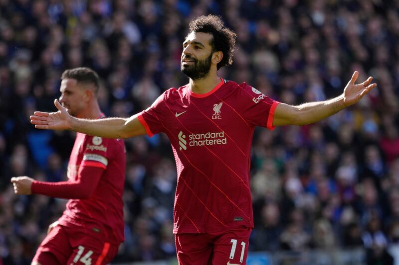 Salah celebrates after scoring. 
AP