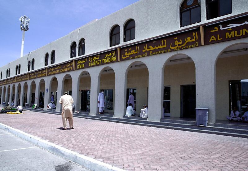 Abu Dhabi, United Arab Emirates, April 18, 2020.  The Carpet Souk at the Zayed Port area.  Carpet salesmen waiting for customers.
Victor Besa / The National
Section:  NA
For:  Standalone/Stock Images