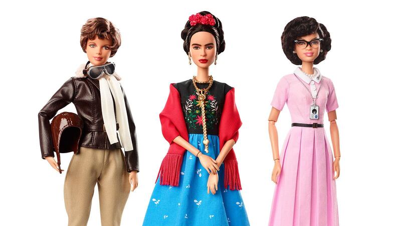 This product image released by Barbie shows dolls in the image of pilot Amelia Earhart, left, Mexican artist Frida Khalo and mathematician Katherine Johnson, part of the Inspiring Women doll line series being launched ahead of International Womenâ€™s Day. (Barbie via AP)