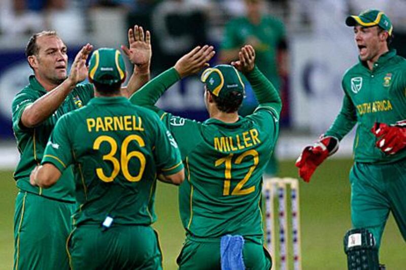 Jacques Kallis, left, ripped the Pakistan batting right after crossing the 11,000-run mark.