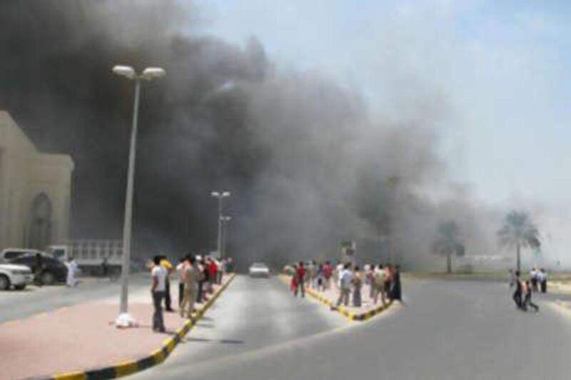 The blaze struck the Al Sha'ab football stadium this morning, and is still on fire.