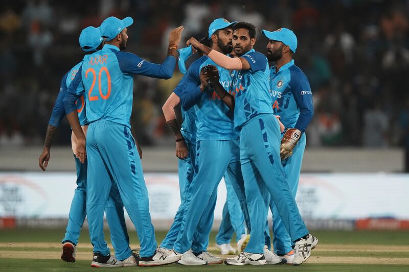 India's Bhuvneshwar Kumar, second right, celebrates with teammates the dismissal of Australia's Cameron Green. AP
