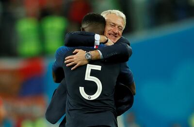 Soccer Football - World Cup - Semi Final - France v Belgium - Saint Petersburg Stadium, Saint Petersburg, Russia - July 10, 2018  France coach Didier Deschamps celebrates with Samuel Umtiti at the end of the match   REUTERS/Lee Smith