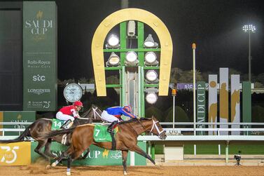 Jockey Luis Saez rides his horse Maximum Security across the finish line in the $20m final of the Saudi Cup last year. AFP PHOTO / SAUDI ROYAL PALACE / BANDAR AL-JALOUD