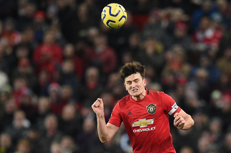 Manchester United defender Harry Maguire heads the ball. AFP