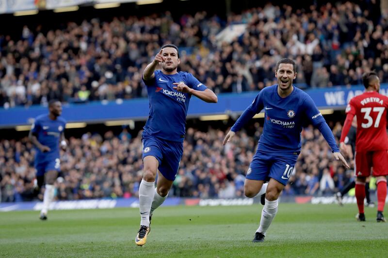 Chelsea's Pedro celebrates scoring his side's first goal next to Eden Hazard, right, during the English Premier League soccer match between Chelsea and Watford at Stamford Bridge stadium in London, Saturday, Oct. 21, 2017. (AP Photo/Matt Dunham)
