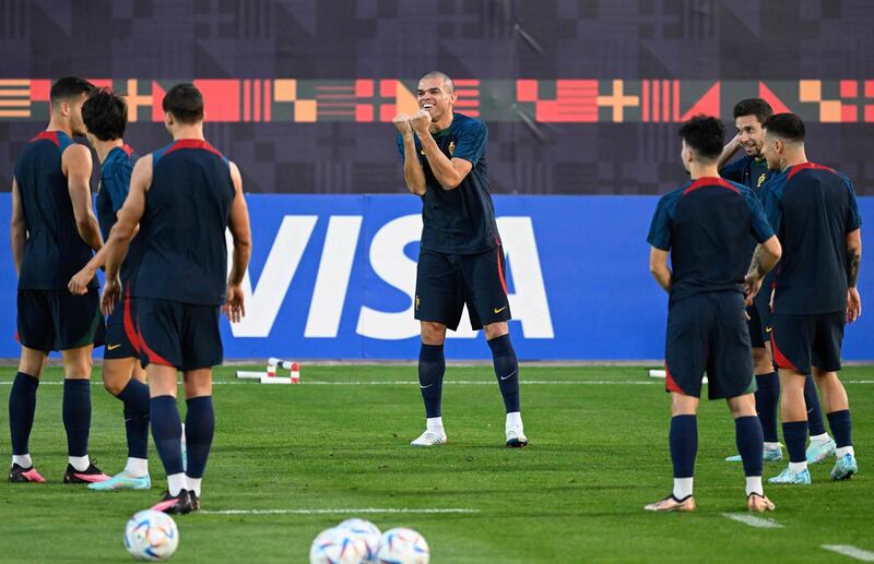 Portugal defender Pepe enjoys a joke with teammates. AFP