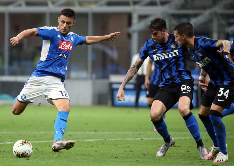 Napoli's Elif Elmas in action against Inter Milan's Alessandro Bastoni. EPA