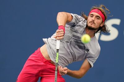 Stefanos Tsitsipas, of Greece, serves to Albert Ramos-Vinolas, of Spain, during the first round of the US Open tennis championships, Monday, Aug. 31, 2020, in New York. (AP Photo/Frank Franklin II)