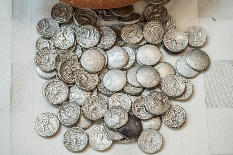 Sharjah Archaeology Authority has unearthed an ancient jar filled with hundreds of priceless coins.