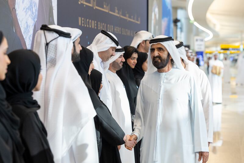 Sheikh Mohammed bin Rashid, Vice President and Ruler of Dubai, greets members of the Mohammed bin Rashid Space Centre. Photo: UAE Presidential Court