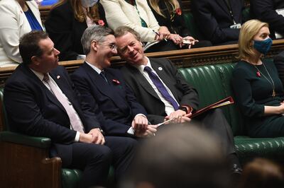 Jacob Rees-Mogg, second left, with Alister Jack, Secretary of State for Scotland, during Prime Minister's Questions at the House of Commons, in London on November 3, 2021. UK Parliament