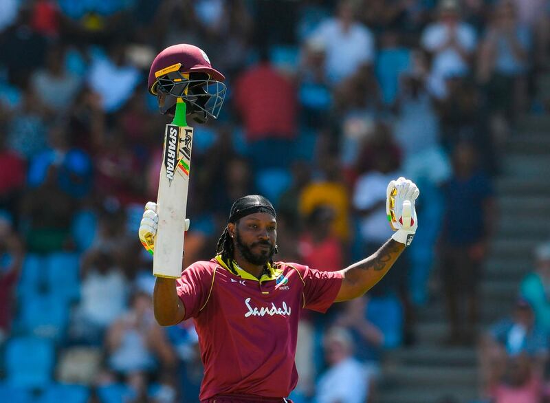 Chris Gayle of West Indies celebrates his half century during the 5th and final ODI between West Indies and England at Darren Sammy Cricket Ground, Gros Islet, Saint Lucia, on March 02, 2019. / AFP / Randy Brooks
