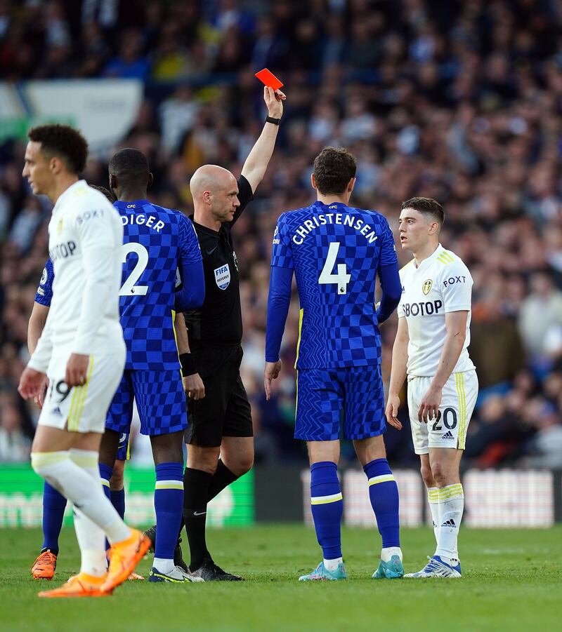 Daniel James is shown a red card. PA