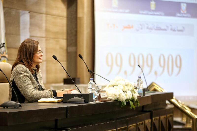 Egyptian Minister of Planning Hala Helmy speaks during a press conference next to a screen displaying the live population count at the Egyptian Ministry of Planning, in Cairo, Egypt.  EPA