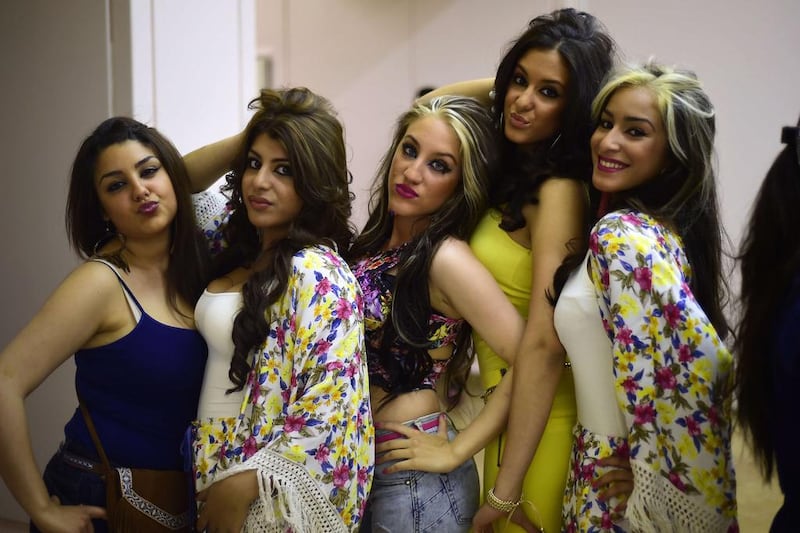 Young gypsies pose during the casting for Miss and Mister Gipsy 2014 in Madrid on 9 May, 2014. AFP