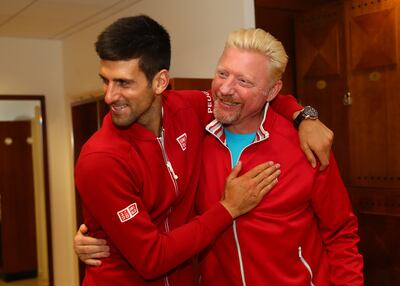 Novak Djokovic clebrating with Boris Becker following his victory during the Men's Singles final match of the 2016 French Open in Paris. Getty Images