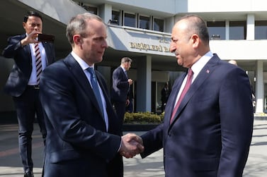 Dominic Raab (L) made his first visit to Turkey. AFP
