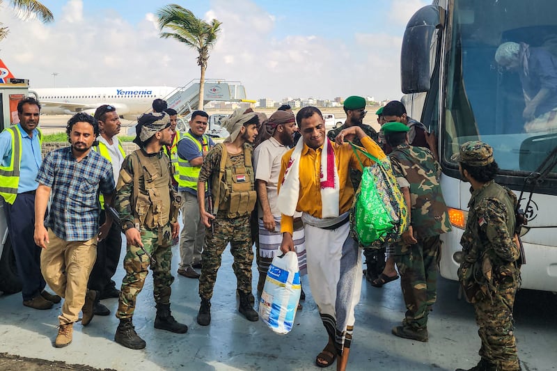 Yemeni Houthi rebel prisoners released as part of a prisoner exchange with the internationally recognised government, before boarding a flight to Sanaa. AFP