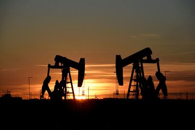  Pump jacks operate at sunset in an oil field in Midland, Texas. Reuters