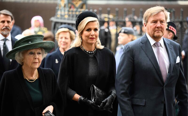 The Netherlands' Princess Beatrix, Queen Maxima and King Willem-Alexander arrive. AFP