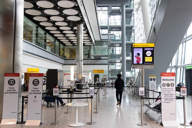 A passenger enters the Covid-19 testing centre at the international arrivals hall in Terminal 5 at London Heathrow Airport in London, UK. Bloomberg