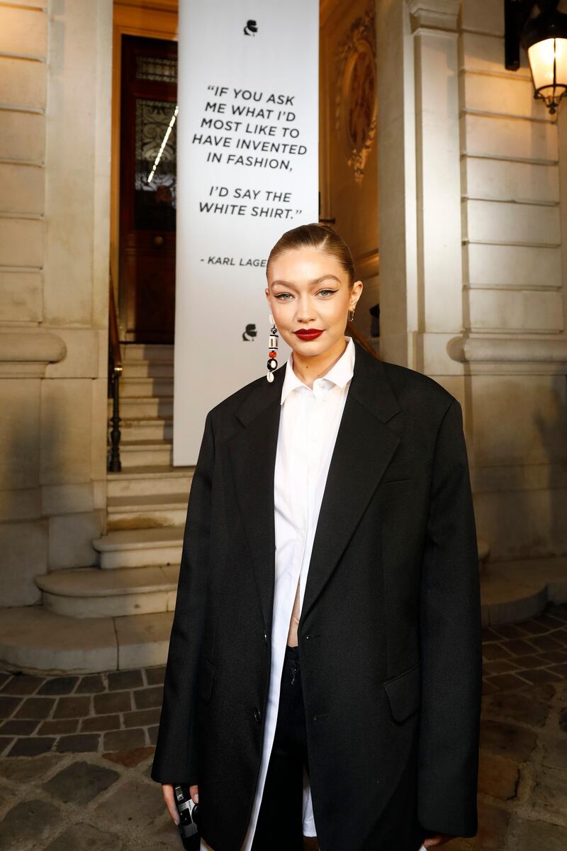 PARIS, FRANCE - SEPTEMBER 25: Gigi Hadid attends the â€œTribute to the Karl Lagerfeld: The White Shirt Projectâ€ exhibition as part of Paris Fashion Week in Paris on September 25, 2019. (Photo by Julien M. Hekimian/Getty Images For Karl Lagerfeld )