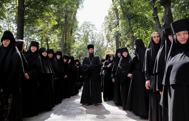 Ukrainian Orthodox nuns attend a prayer service in downtown Kiev, Ukraine. . Orthodox believers mark the 1031th anniversary of Kievan Rus Christianisation. EPA