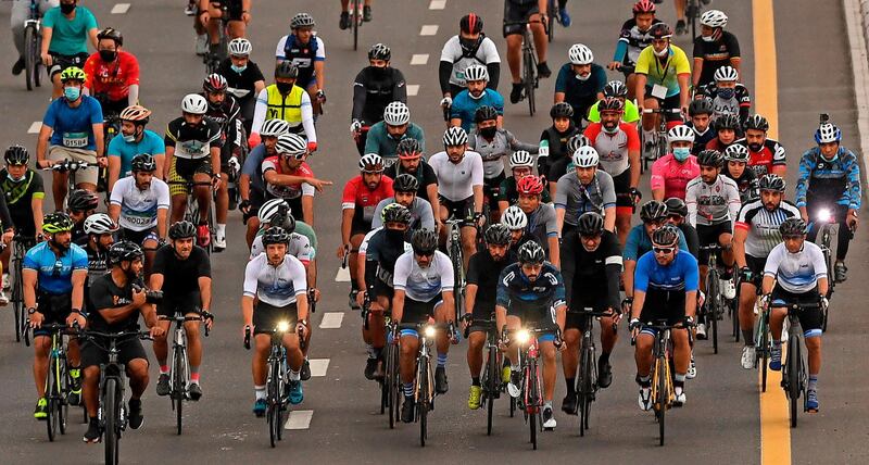 Sheikh Hamdan with other cyclists. Karim Sahib / AFP