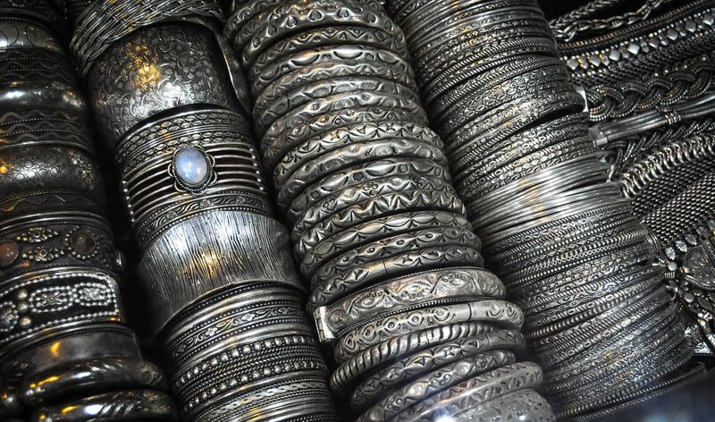 Bangle Alley in Jaipur is full of handmade bangles for sale to locals and tourists alike. Pictured here are silver bangles with semi-precious stones, textured wide bangles, and narrow engraved bangles.