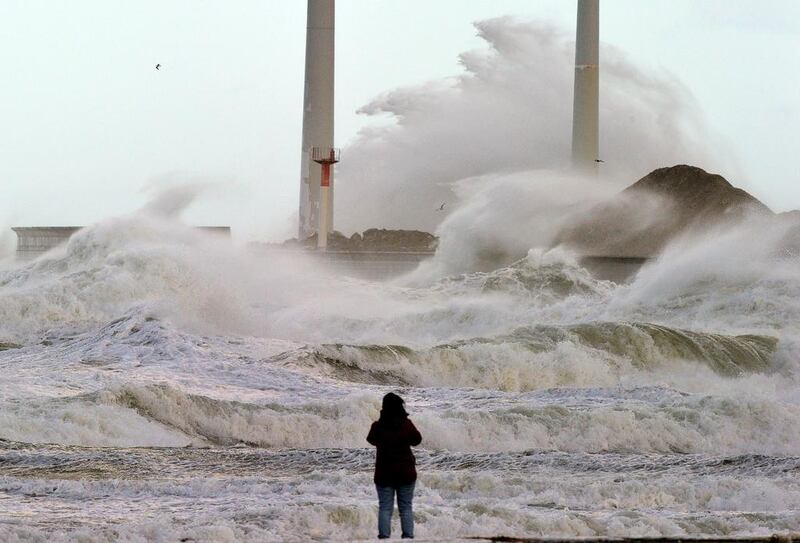 Waves batter the coast of the English Channel port of Boulogne-sur-mer, France, on November 3, 2013. Philippe Hugen  / AFP photo