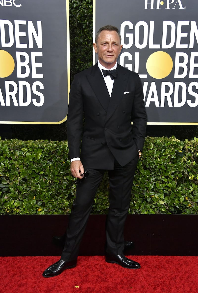 Daniel Craig, wearing Anderson and Sheppard, arrives at the 77th annual Golden Globe Awards at the Beverly Hilton Hotel on January 5, 2020. AFP