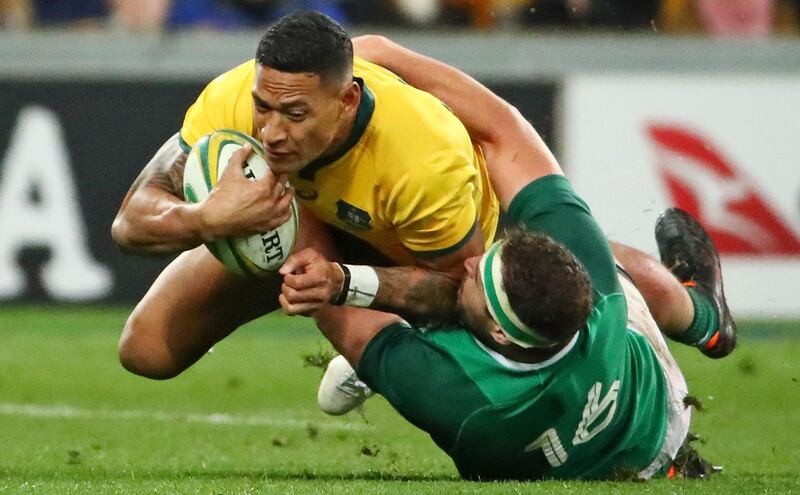 MELBOURNE, AUSTRALIA - JUNE 16:  Israel Folau of the Wallabies  is tackled by Rob Herring of Ireland during the International test match between the Australian Wallabies and Ireland at AAMI Park on June 16, 2018 in Melbourne, Australia.  (Photo by Scott Barbour/Getty Images)